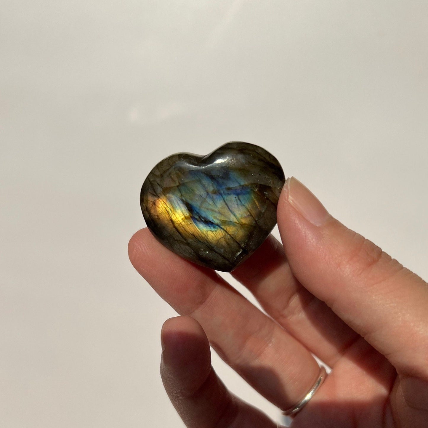 Rainbow multi flash labradorite heart pocket piece