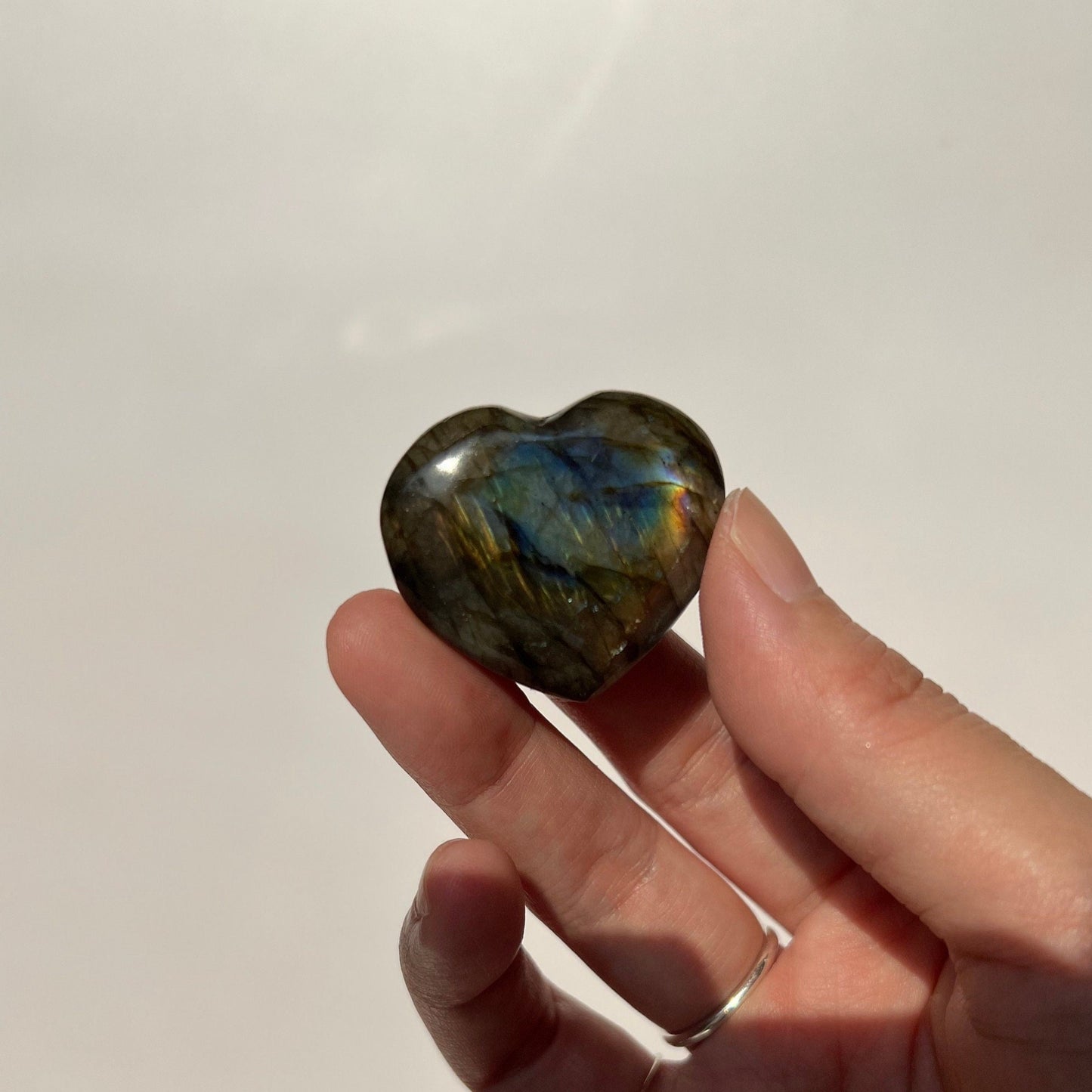 Rainbow multi flash labradorite heart pocket piece