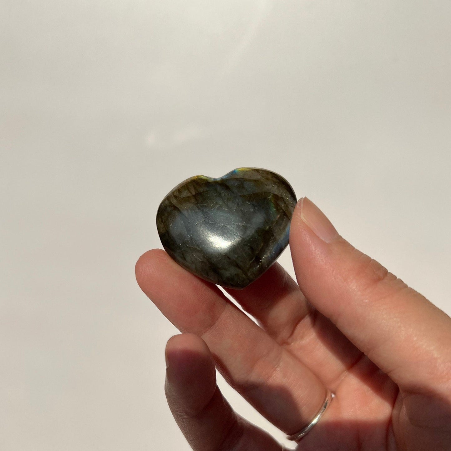 Rainbow multi flash labradorite heart pocket piece