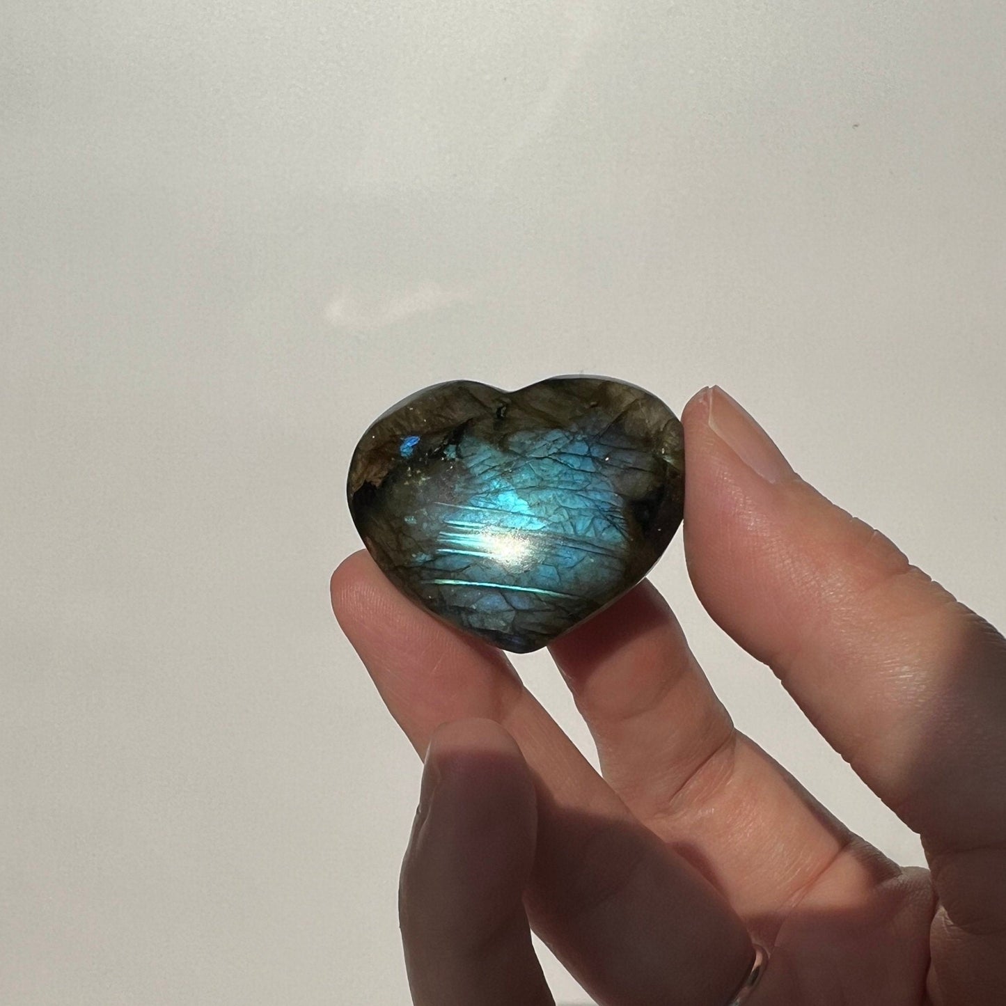 Blue full flash labradorite heart pocket piece