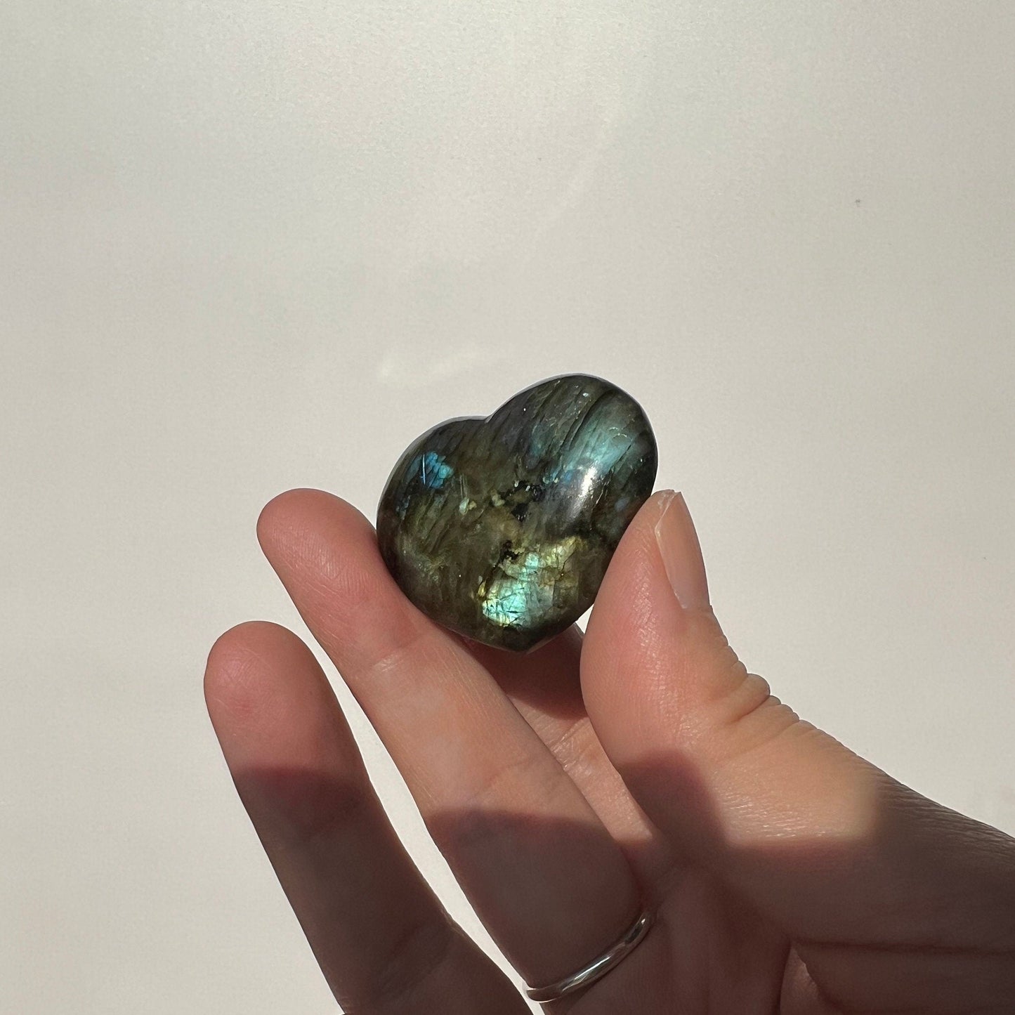 Blue full flash labradorite heart pocket piece